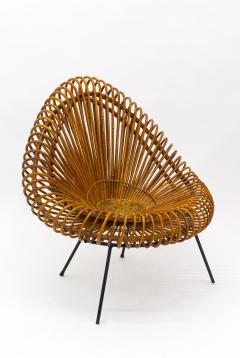 A stylish rattan and iron chair designed by Janine Abraham  - 1857158