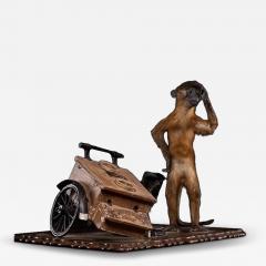 A taxidermy Golden bellied Mangabey Monkey mounted on a wooden plinth - 4269492