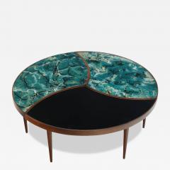 A three part biomorphic marbleized glass and walnut circular coffee table  - 3371591