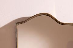 A wall mirror with brass frame Italy 1950s - 4353140