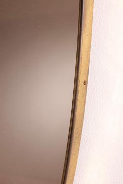 A wall mirror with brass frame Italy 1950s - 4353141