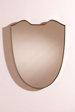 A wall mirror with brass frame Italy 1950s - 4353142