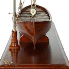 A working model of a ship s personnel lifeboat on davits - 3714621