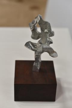 ABSTRACT METAL SCULPTURE on WALNUT BASE - 3116509