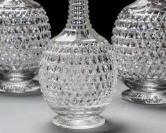 AN ELABORATELY CUT SUITE OF DECANTERS - 3787930
