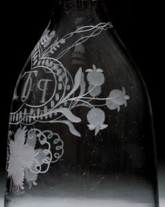 AN ELEGANTLY ENGRAVED PORT DECANTER - 4752673