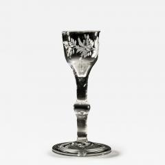 AN ENGRAVED PLAIN STEM WINE GLASS - 3796619