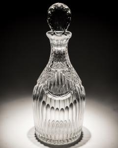 AN INTAGLIO CUT GLASS DECANTER - 3960374