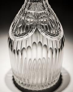 AN INTAGLIO CUT GLASS DECANTER - 3960391