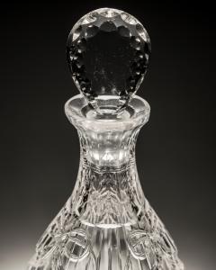 AN INTAGLIO CUT GLASS DECANTER - 3960392