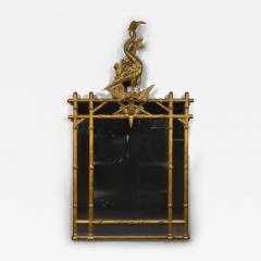 AN INTERESTING LATE REGENCY CARVED GILTWOOD MIRROR SURMOUNTED BY A CARVED HERON - 4226923