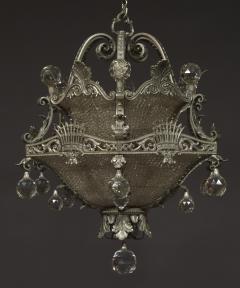 AN UNUSUAL FINELY CAST AND SILVERED BRONZE FACETED GLASS MOUNTED CHANDELIER - 3906457