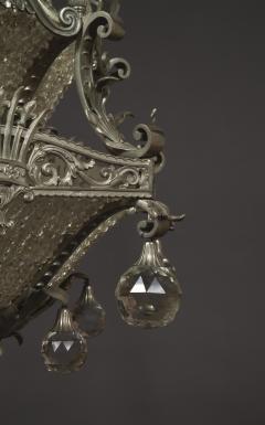 AN UNUSUAL FINELY CAST AND SILVERED BRONZE FACETED GLASS MOUNTED CHANDELIER - 3906465