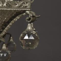 AN UNUSUAL FINELY CAST AND SILVERED BRONZE FACETED GLASS MOUNTED CHANDELIER - 3906466