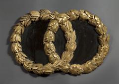 AN UNUSUAL NEOCLASSICAL MIRROR IN THE FORM OF INTERLOCKING LAUREL WREATHS - 4224387