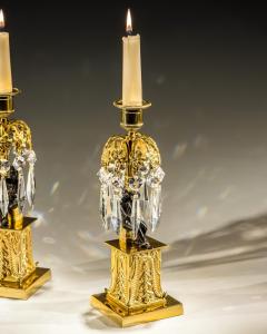 AN UNUSUAL PAIR OF GILT BRONZE MILITARY FIGURE CANDLESTICKS - 3787899