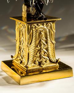 AN UNUSUAL PAIR OF GILT BRONZE MILITARY FIGURE CANDLESTICKS - 3787983