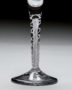 AN UNUSUAL PAIR OF MIXED TWIST WINE GLASSES - 4752684