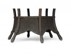 ANTIQUE 6 LEGGED WICKER TABLE - 2425659