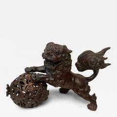 ANTIQUE PATINATED IRON FOO DOG WITH GILT BALL WITH FLOWERS SCULPTURE - 3603039
