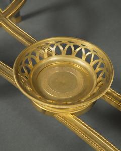 Adam Weisweiler AN EXQUISITE STEEL AND GILT BRONZE CENTER TABLE WITH FOSSIL MARBLE TOP - 3526092