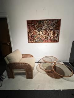 Adrian Pearsall MODERNIST TRIPLE TIER WICKER AND AMBER GLASS SWIVELING COFFEE TABLE - 2809872