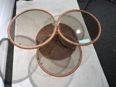 Adrian Pearsall MODERNIST TRIPLE TIER WICKER AND AMBER GLASS SWIVELING COFFEE TABLE - 2809879