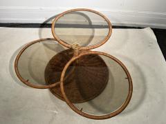 Adrian Pearsall MODERNIST TRIPLE TIER WICKER AND AMBER GLASS SWIVELING COFFEE TABLE - 2809880