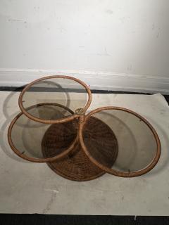 Adrian Pearsall MODERNIST TRIPLE TIER WICKER AND AMBER GLASS SWIVELING COFFEE TABLE - 2809885
