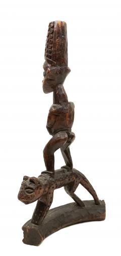 African Sculpture of a Figure Standing on a Leopard - 4408197