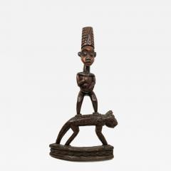 African Sculpture of a Figure Standing on a Leopard - 4412463