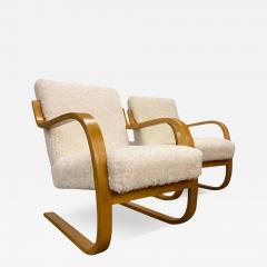 Alvar Aalto Alvar Aalto Pair of Sheepskin Paded Cantilever Armchairs Model 402 Artek 1950s - 3969291