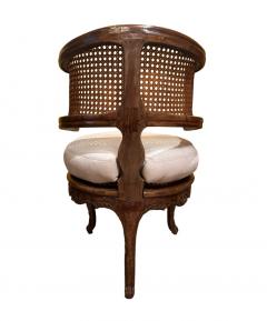 An 19th Century Oval Handcarved Walnut and cane corner chair - 3726182