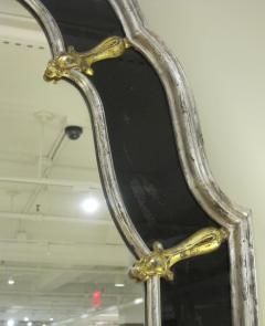 An American Hollywood regency silver gilt wood mirror with black glass border - 276124