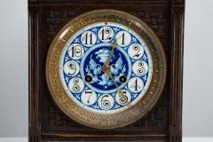 An Anglo Japanese Carved Oak Mantel Clock with Hand Painted Blue Floral Dial - 4189021