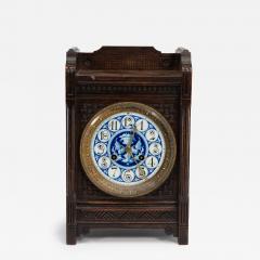 An Anglo Japanese Carved Oak Mantel Clock with Hand Painted Blue Floral Dial - 4232751