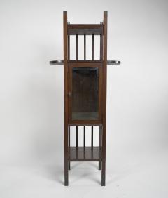 An Anglo Japanese style Mahogany side cabinet of slender form with brass sabots  - 4192677