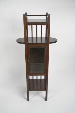 An Anglo Japanese style Mahogany side cabinet of slender form with brass sabots  - 4192678