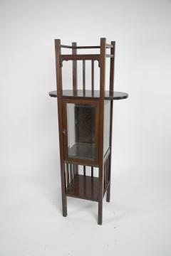 An Anglo Japanese style Mahogany side cabinet of slender form with brass sabots  - 4192679