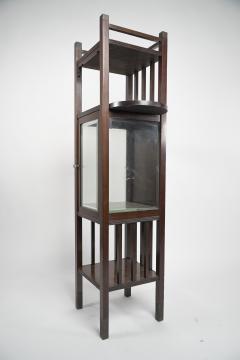 An Anglo Japanese style Mahogany side cabinet of slender form with brass sabots  - 4192680