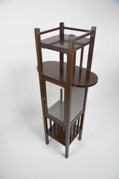 An Anglo Japanese style Mahogany side cabinet of slender form with brass sabots  - 4192681