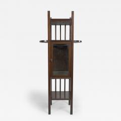 An Anglo Japanese style Mahogany side cabinet of slender form with brass sabots  - 4234493