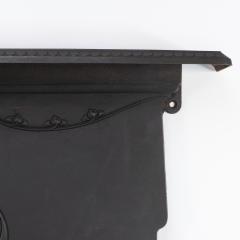 An Arts Crafts Art Nouveau Cast Iron Fireplace with Stylized Floral Details - 4189352