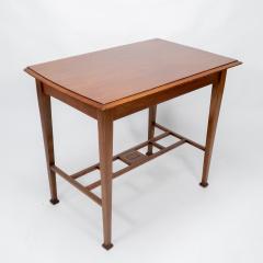 An Arts Crafts Glasgow School walnut side table w moulded subtly curving edge - 4236740