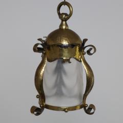 An Arts Crafts Hammered Brass Lantern with Opaque Ribbed Glass Liner - 4192771