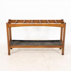 An Arts Crafts Oak Stick Umbrella Stand with Fourteen Sections - 4192798