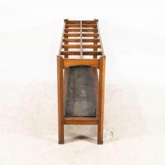 An Arts Crafts Oak Stick Umbrella Stand with Fourteen Sections - 4192800