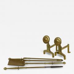 An Arts Crafts Set of Brass Fire Dogs Matching Utensils - 4232811