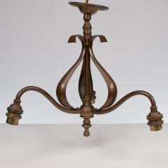 An Arts Crafts Three Branch Brass Ceiling Light with Stylized Leaf Detail - 4192855