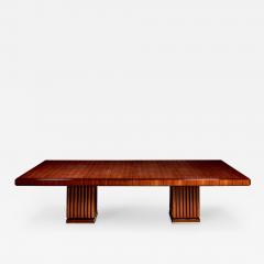 An Extendable Dining Table with Fluted Base by Iliad Design - 454782